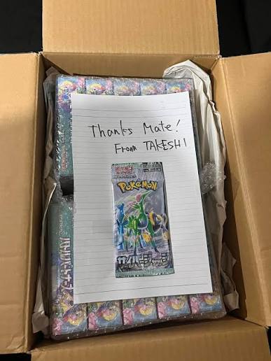 Booster box with handwritten thank you note from supplier